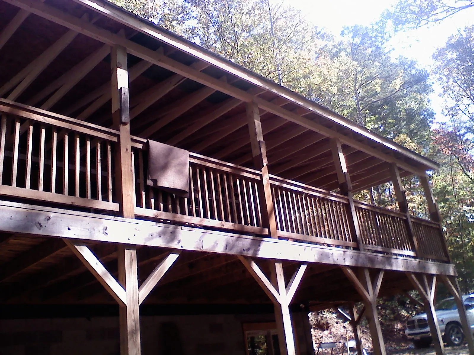 Timber framing under a new elevated porch and deck — Roof Leak Repair in Moroni by Roofing Brothers